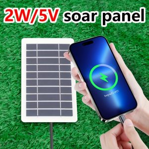 A Portable Outdoor Solar USB Charger for Travel And Camping, Featuring a Movable Solar Panel for Charging Phones, Flashlights, And Fans, Making It Convenient for Outings with Pets.